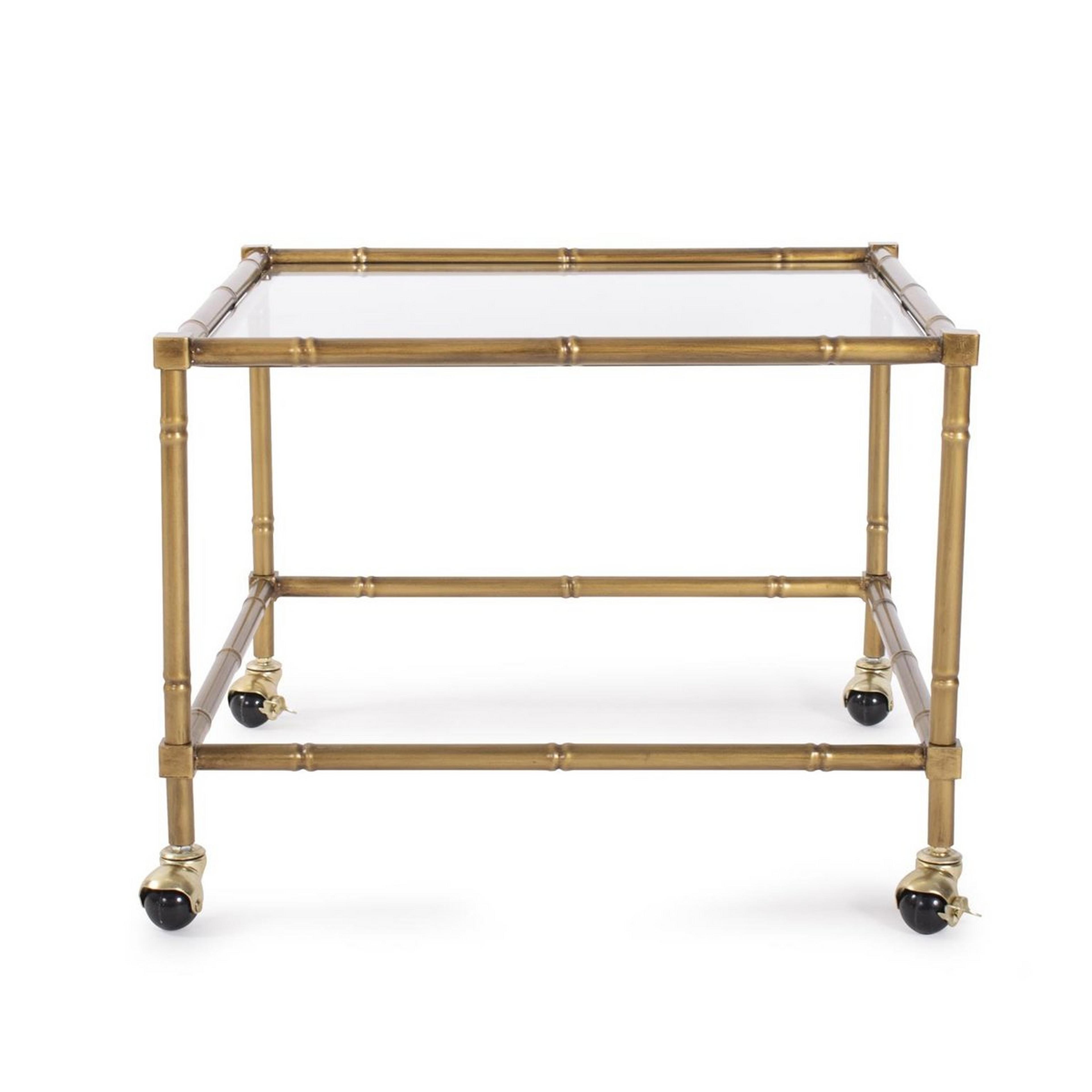 A Mahajanga Rolling Side Table with Aged Gold / Clear Glass color