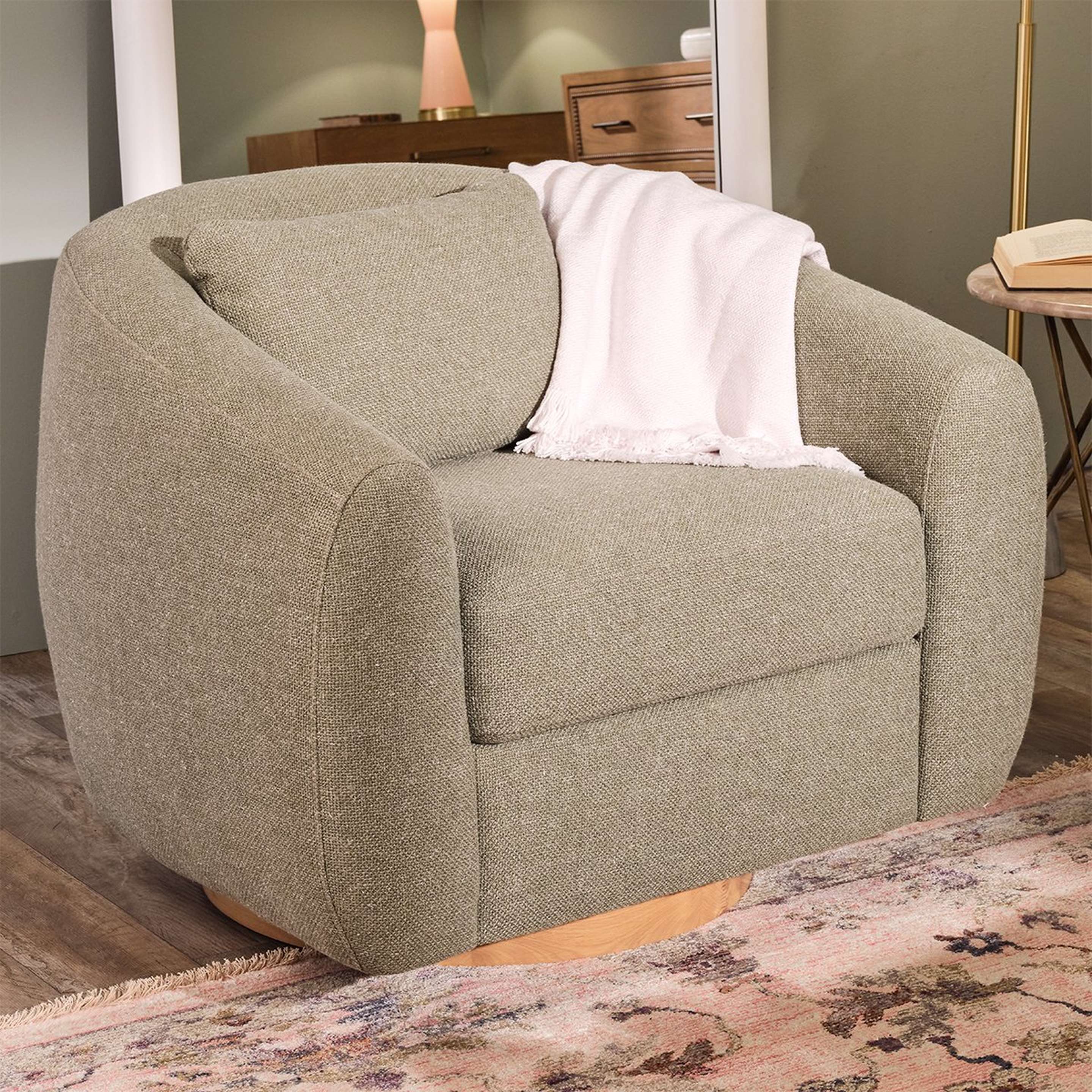 A Finn Swivel Chair with Light Green color