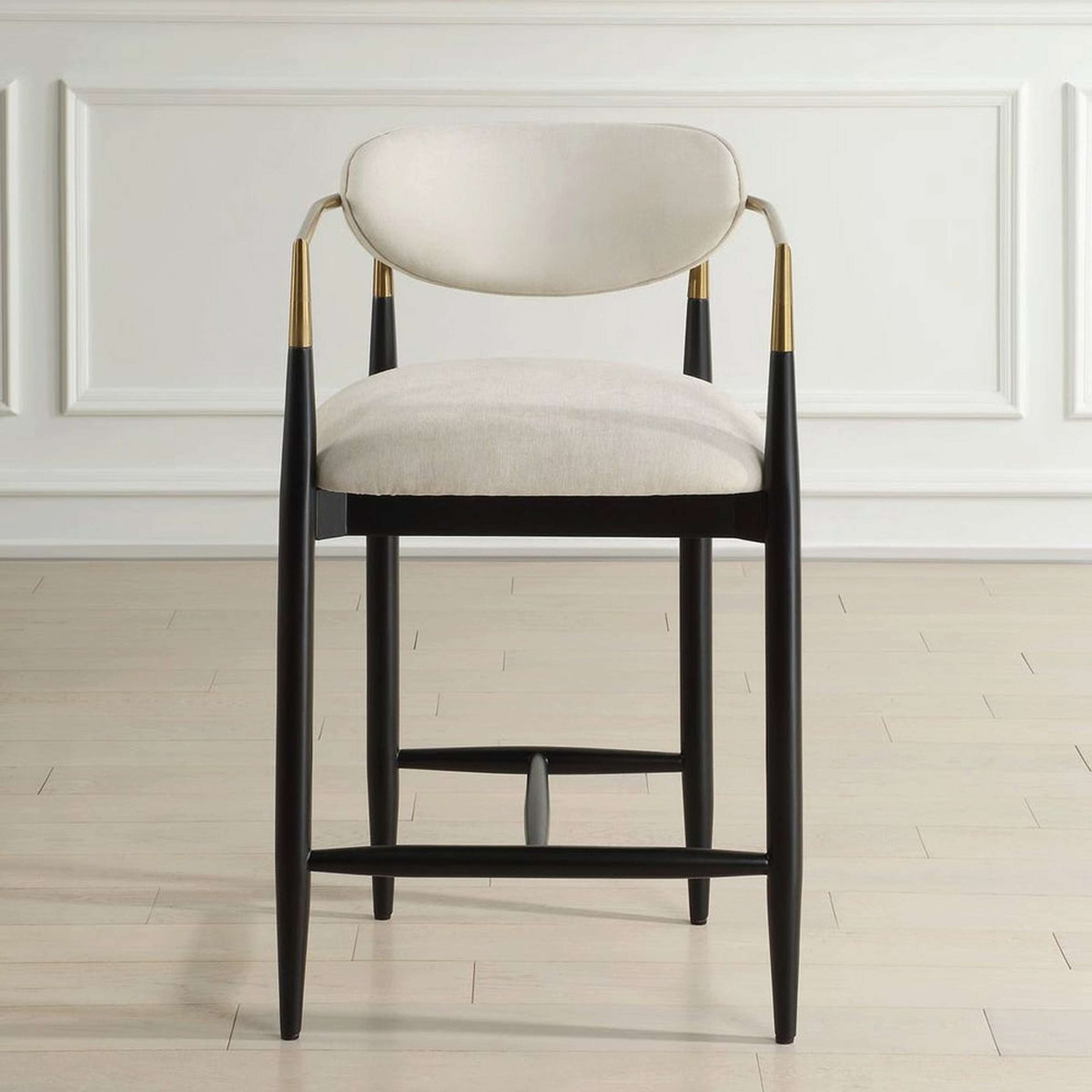 A Celia Counter Stool with Black / Cream Velvet Upholstery / Brass color