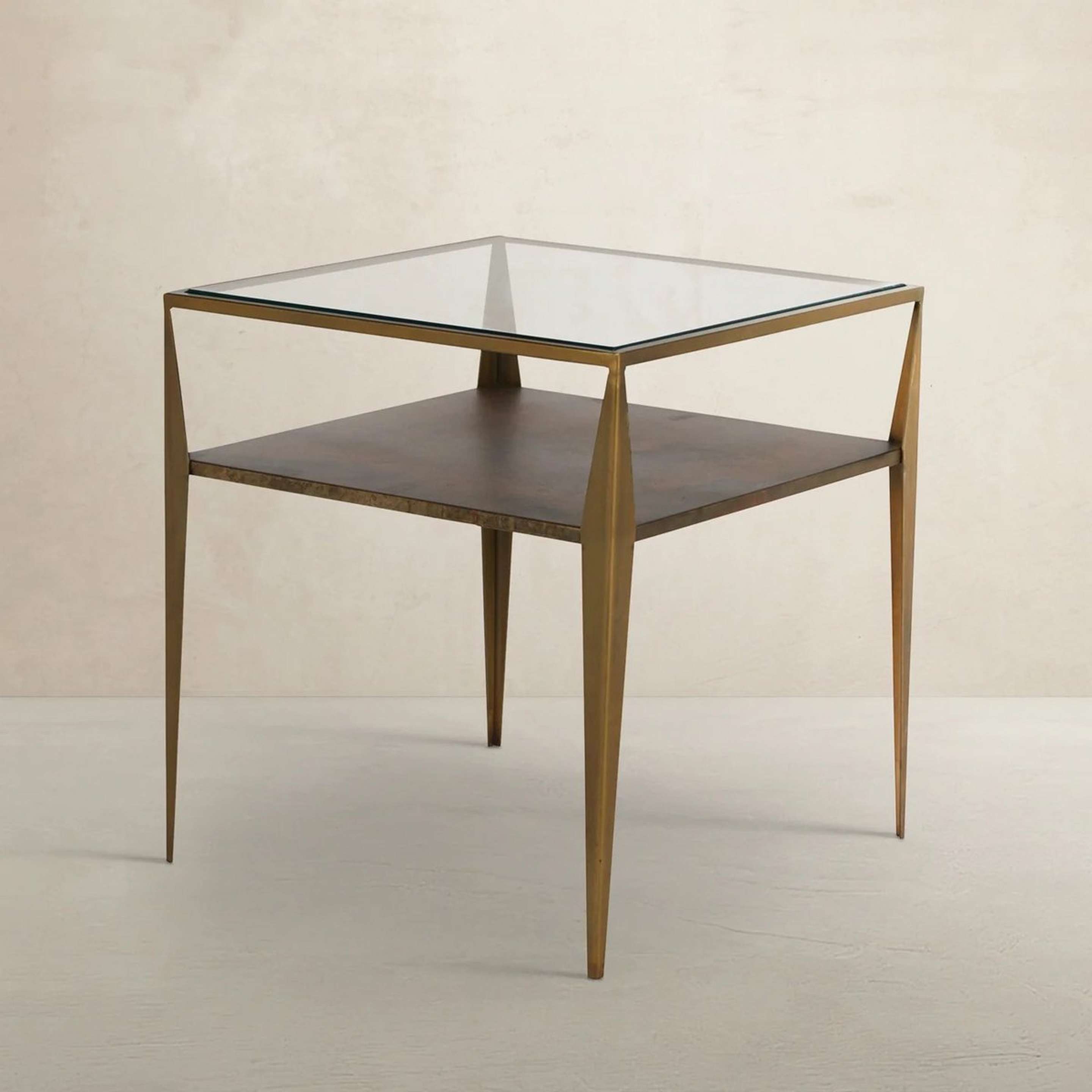 A Sciotti Side Table with Brass / Clear Glass color