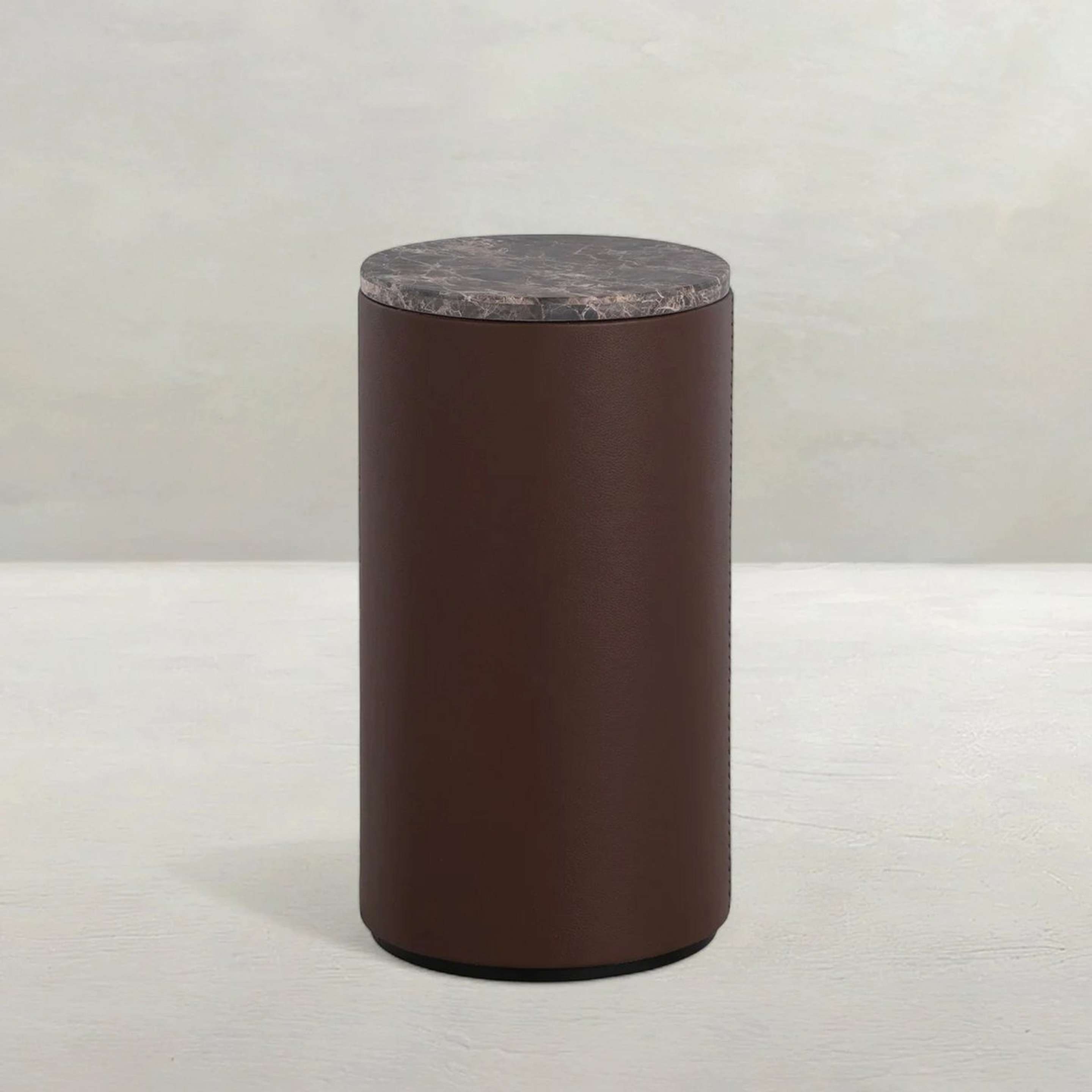A Byrum Side Table with Brown / Gray color