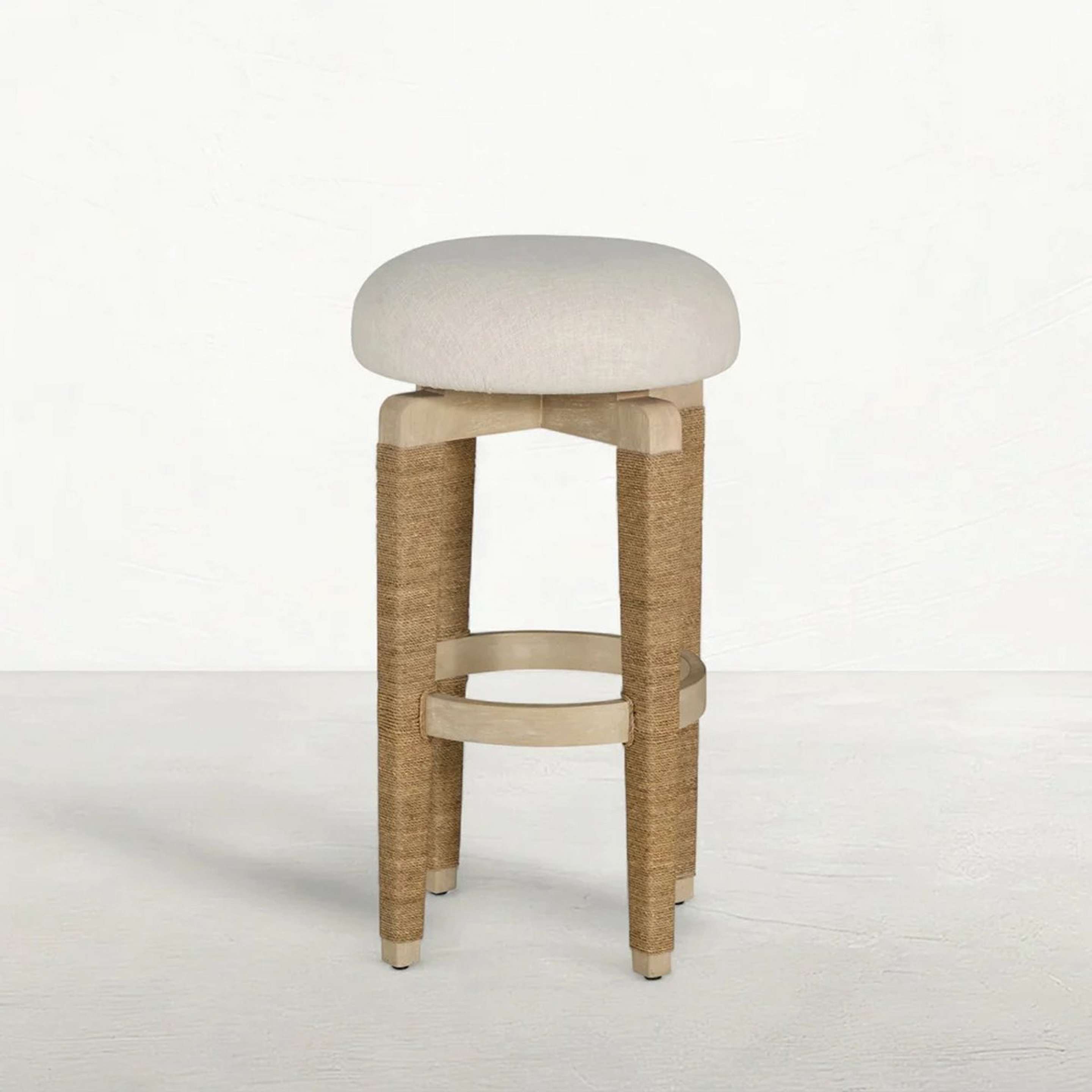 A Daryl Swivel Bar Stool with Beige / Tan Rope color