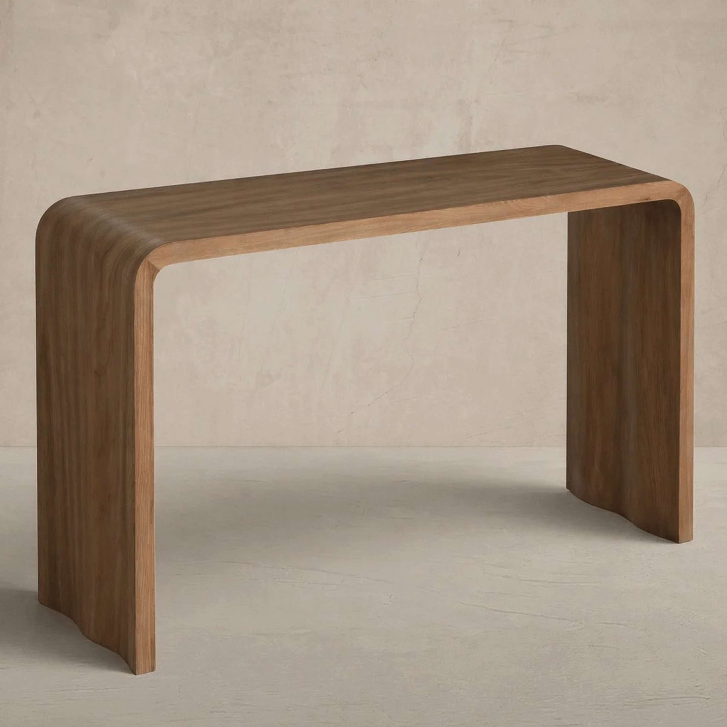 A Sybella Console Table with Natural Wood color