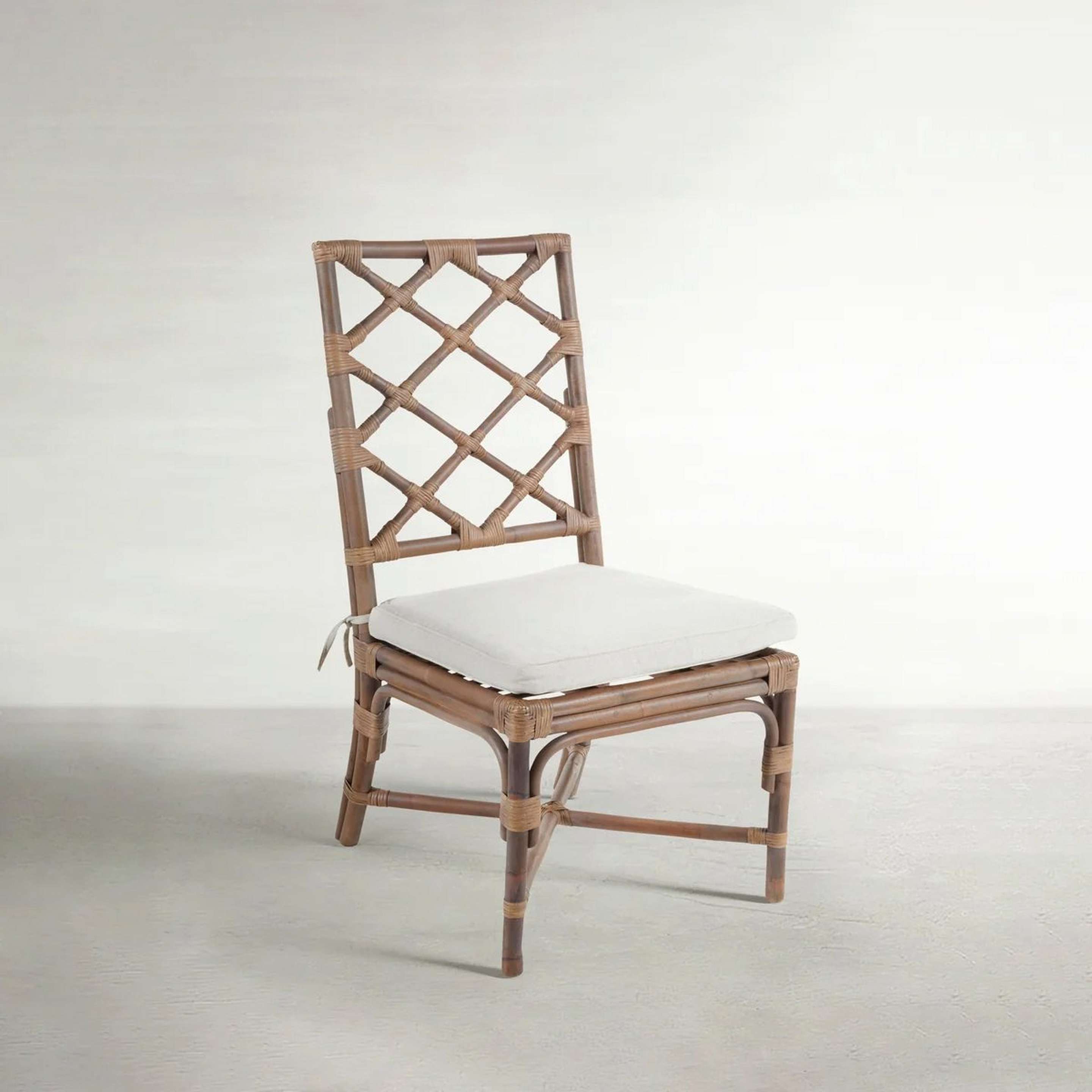 A Fernando Dining Chair with Natural Rattan color