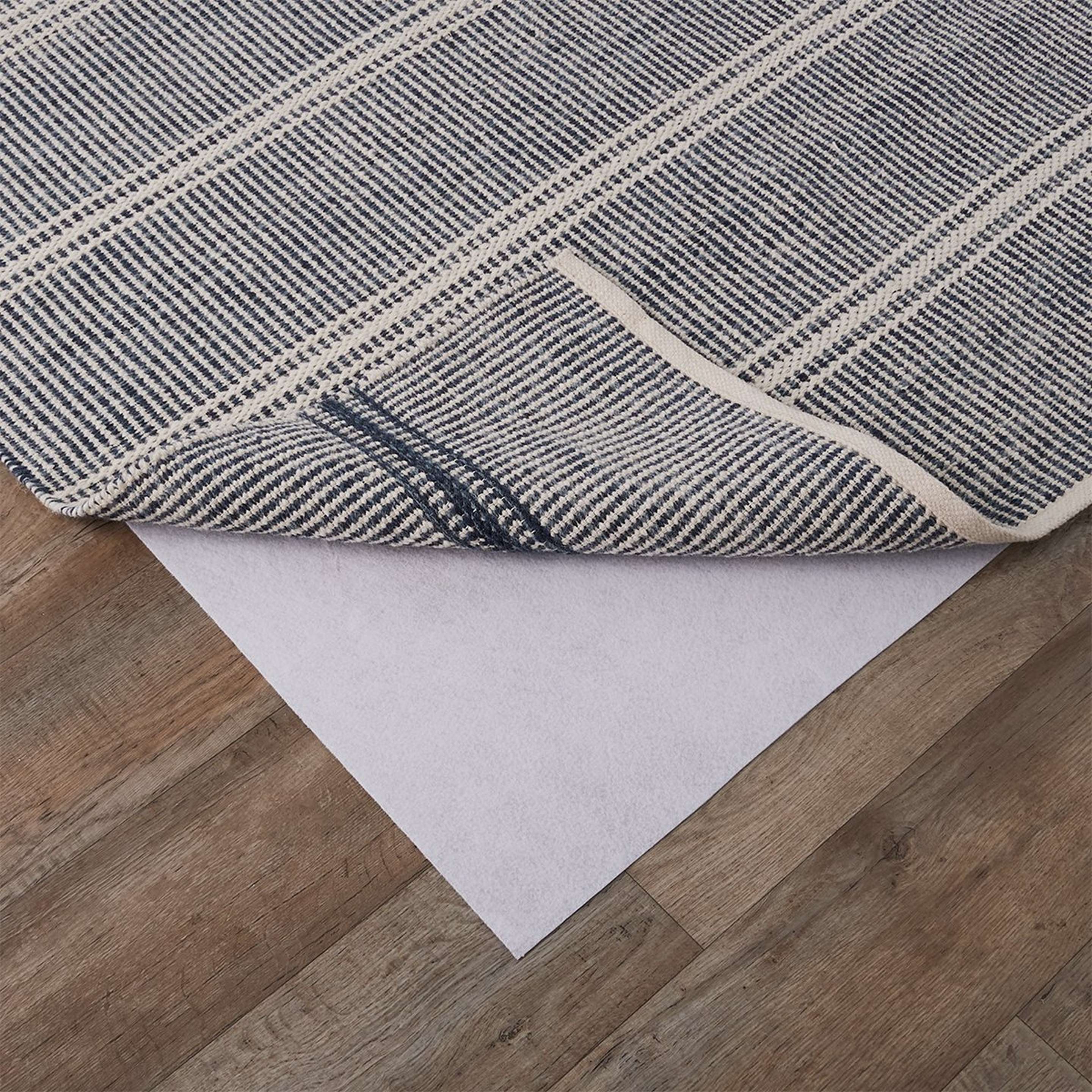 A Magic Stop Rug Pad with White color