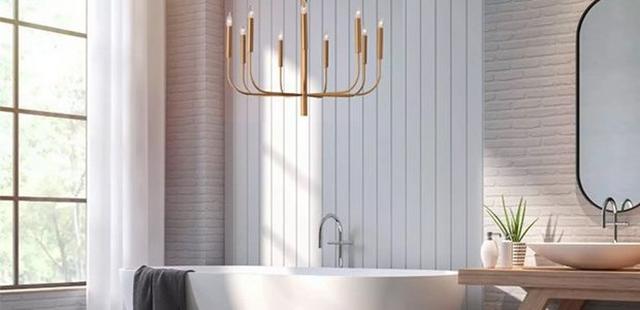 Large modern bathroom chandelier over bathtub