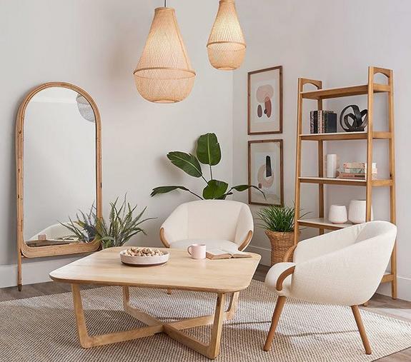 Boho Living Room With Light Wood Coffee Table And Chairs