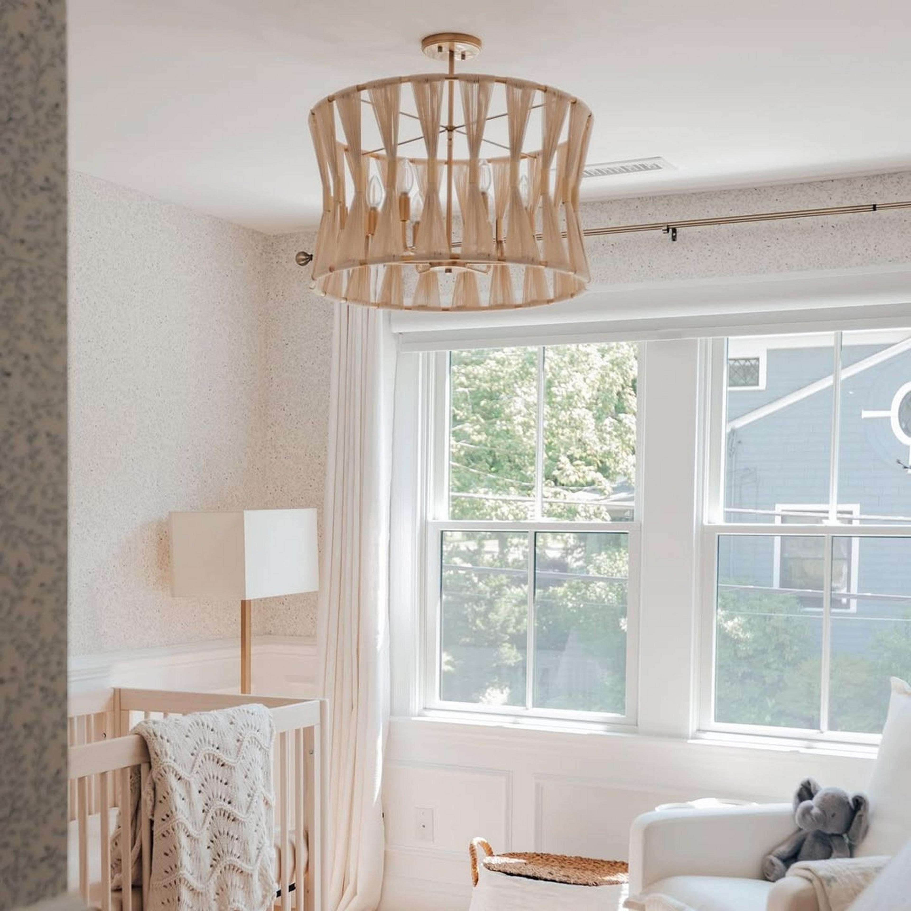 Brass and Natural Ivory Rope Axel chandelier in a child's nursery