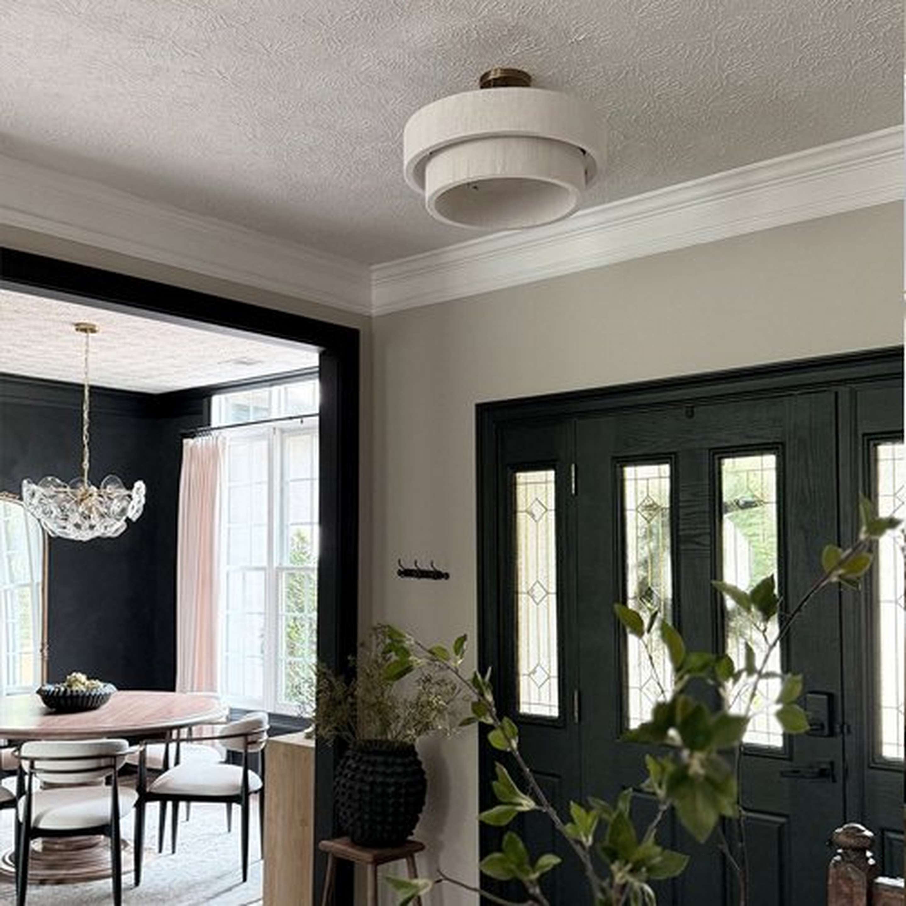 Kalini Double Drum Convertible Chandelier in an entryway 