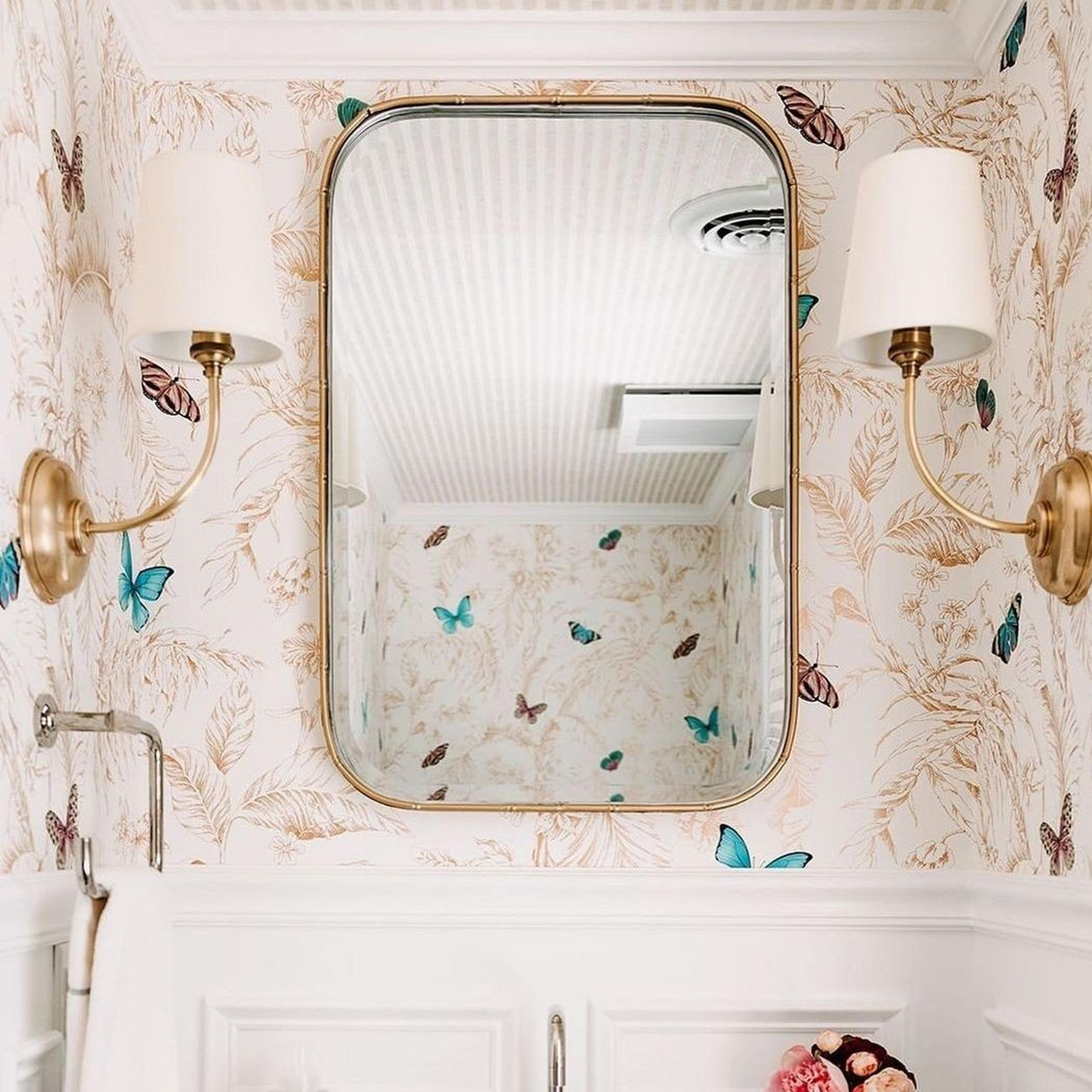 Bamboo border mirror in bathroom with butterfly wallpaper