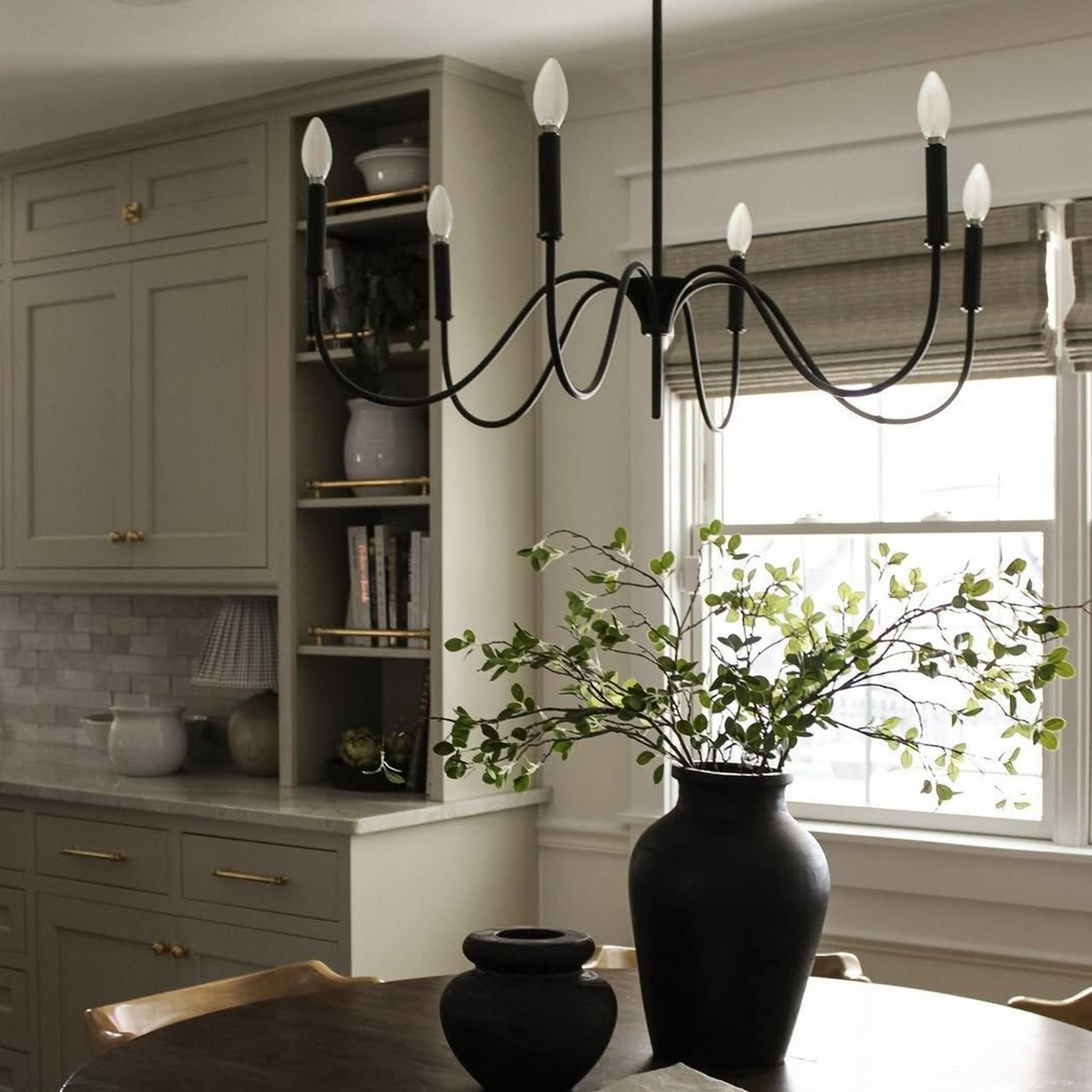 Black Cousteau Chandelier over a round table