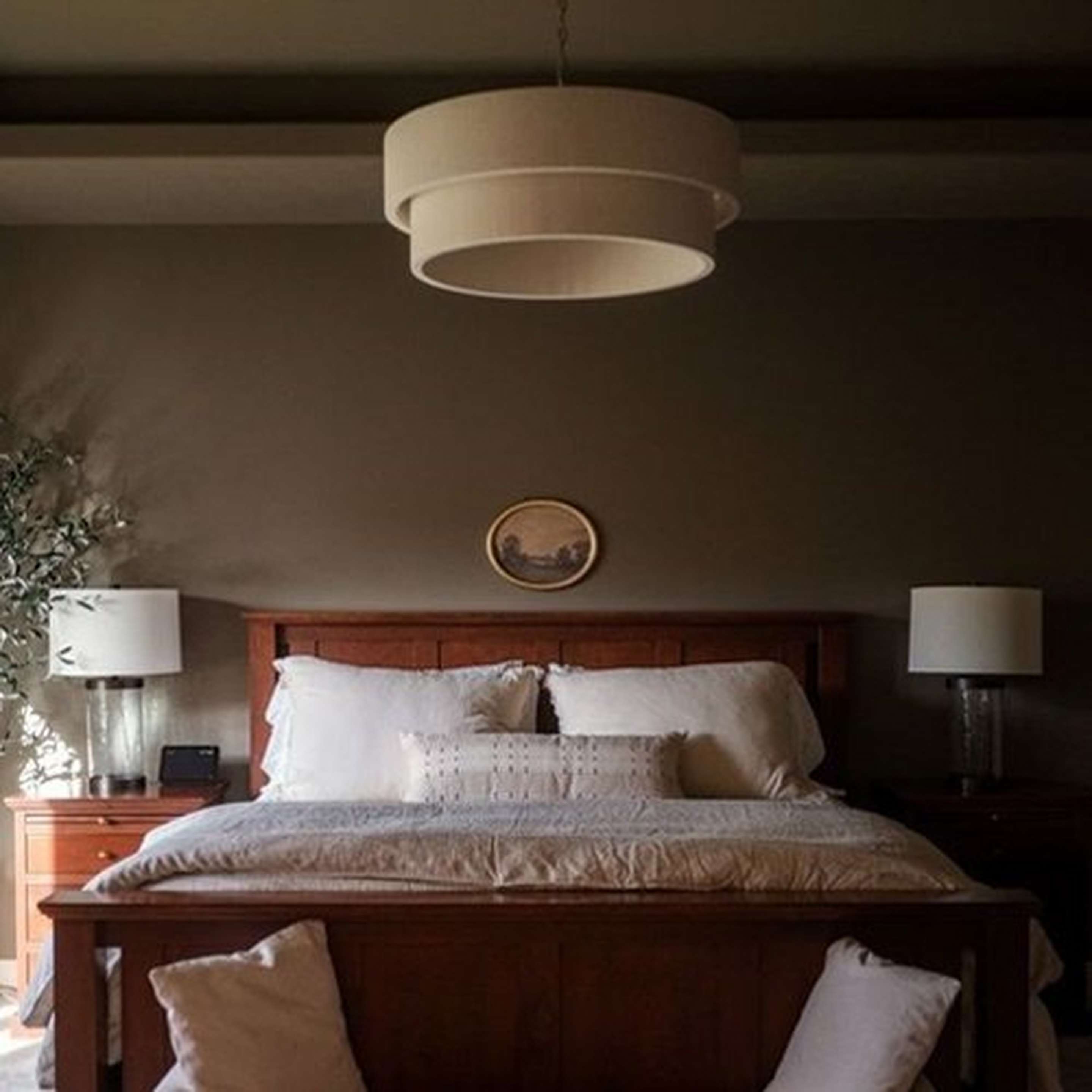 Kalini Double Drum Chandelier in a bedroom