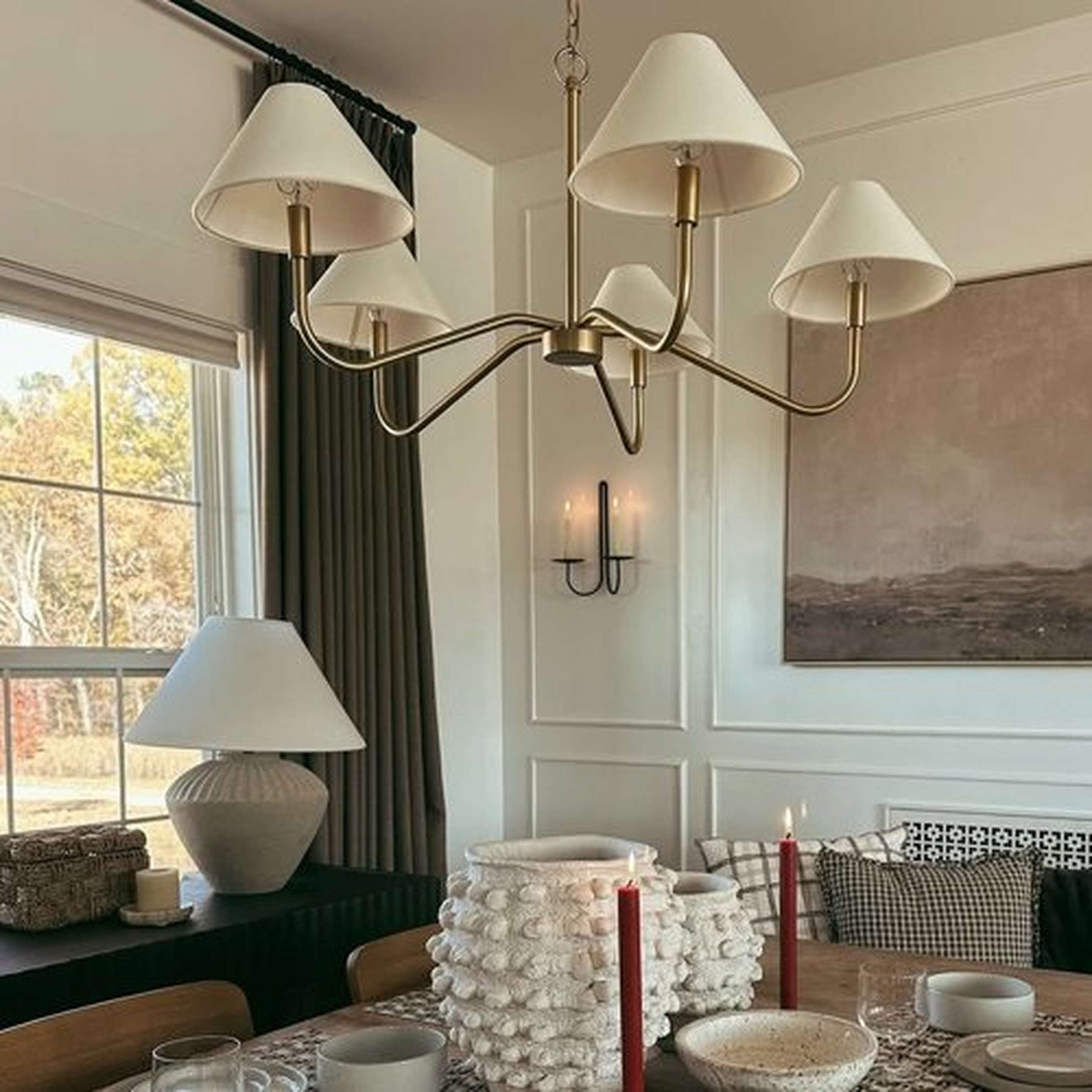 Eldon Chandelier above a dining room table