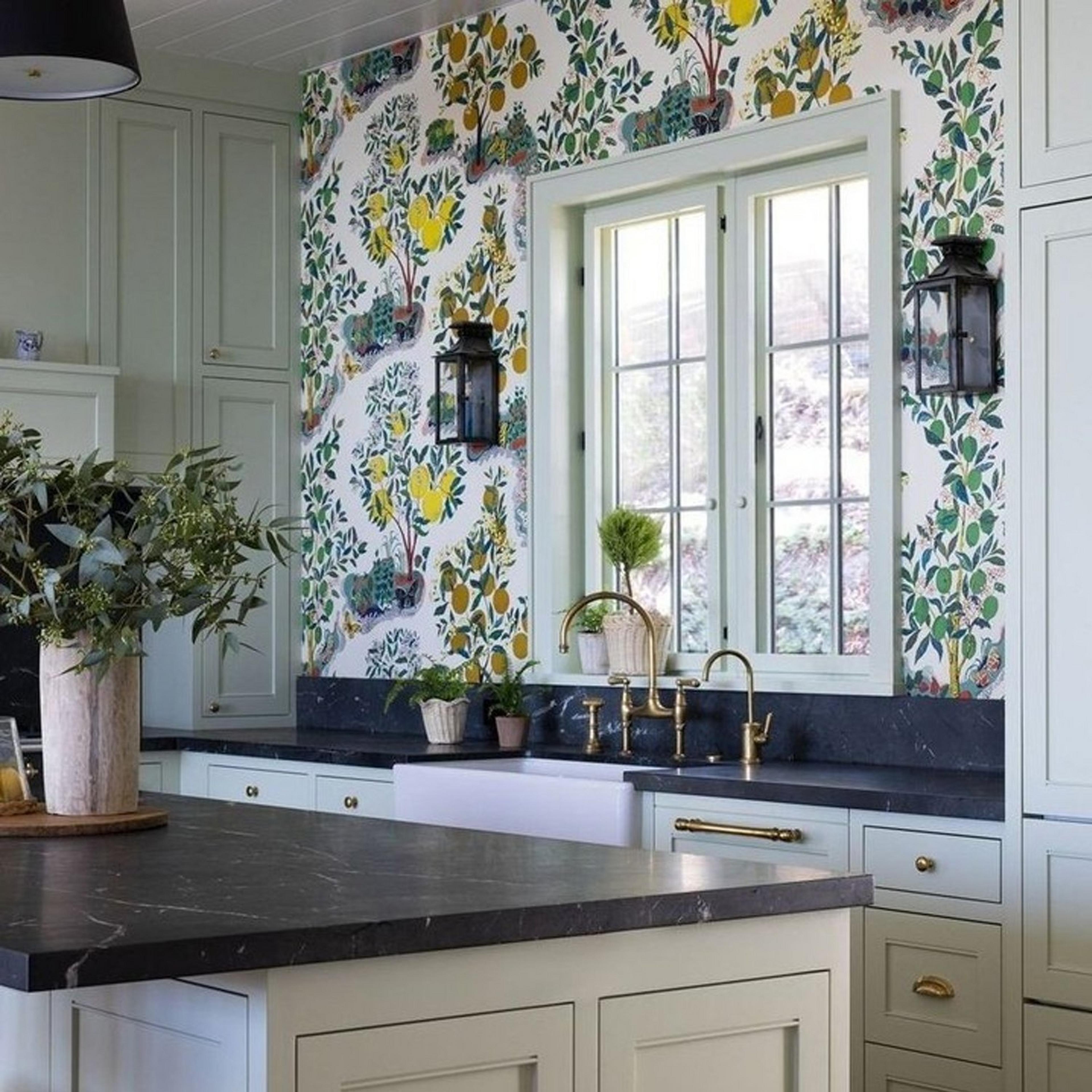 Colonial Metalcrafts outdoor wall sconce in kitchen with floral wall paper