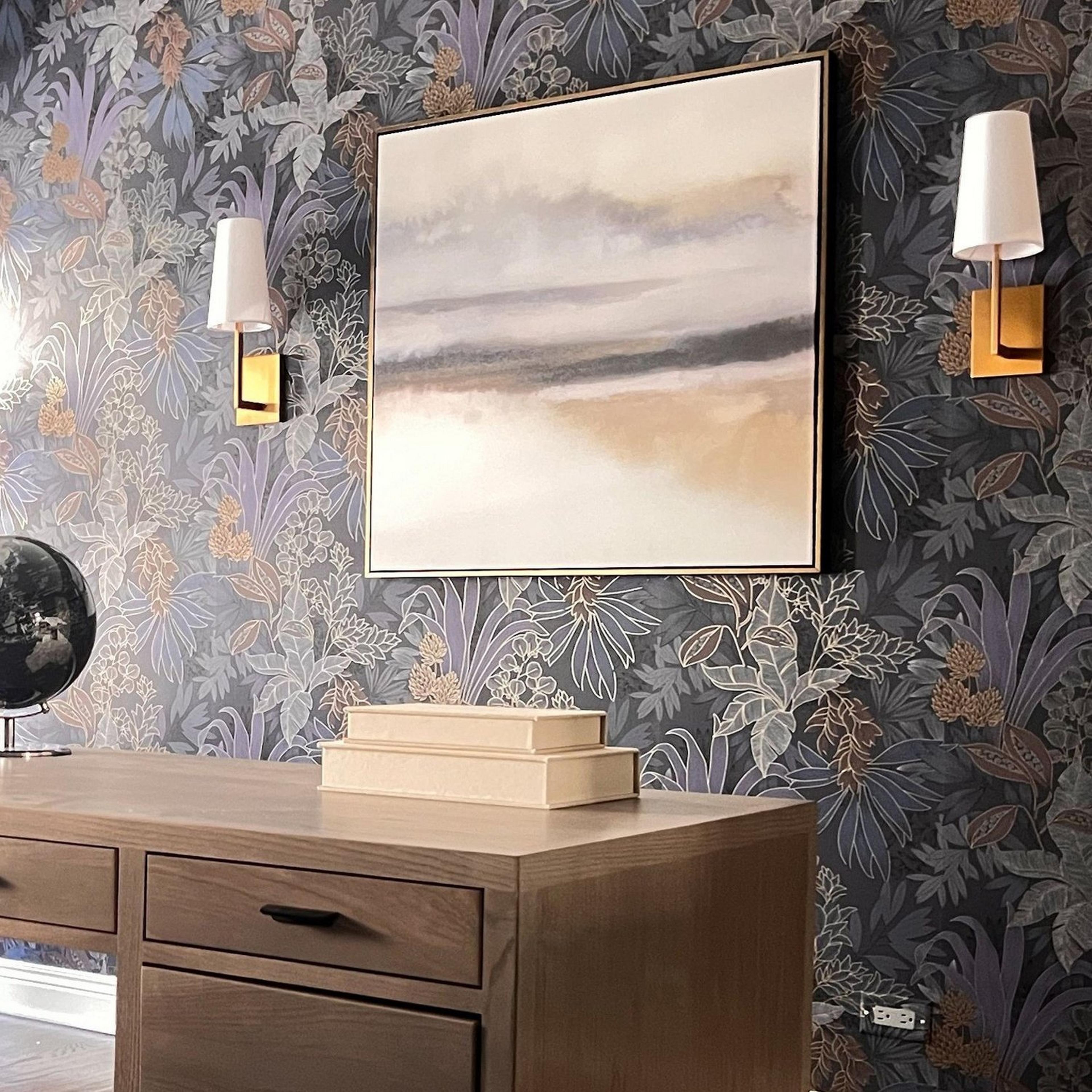 Two aged brass Demure Simplicity Sconces in a study with botanical wallpaper