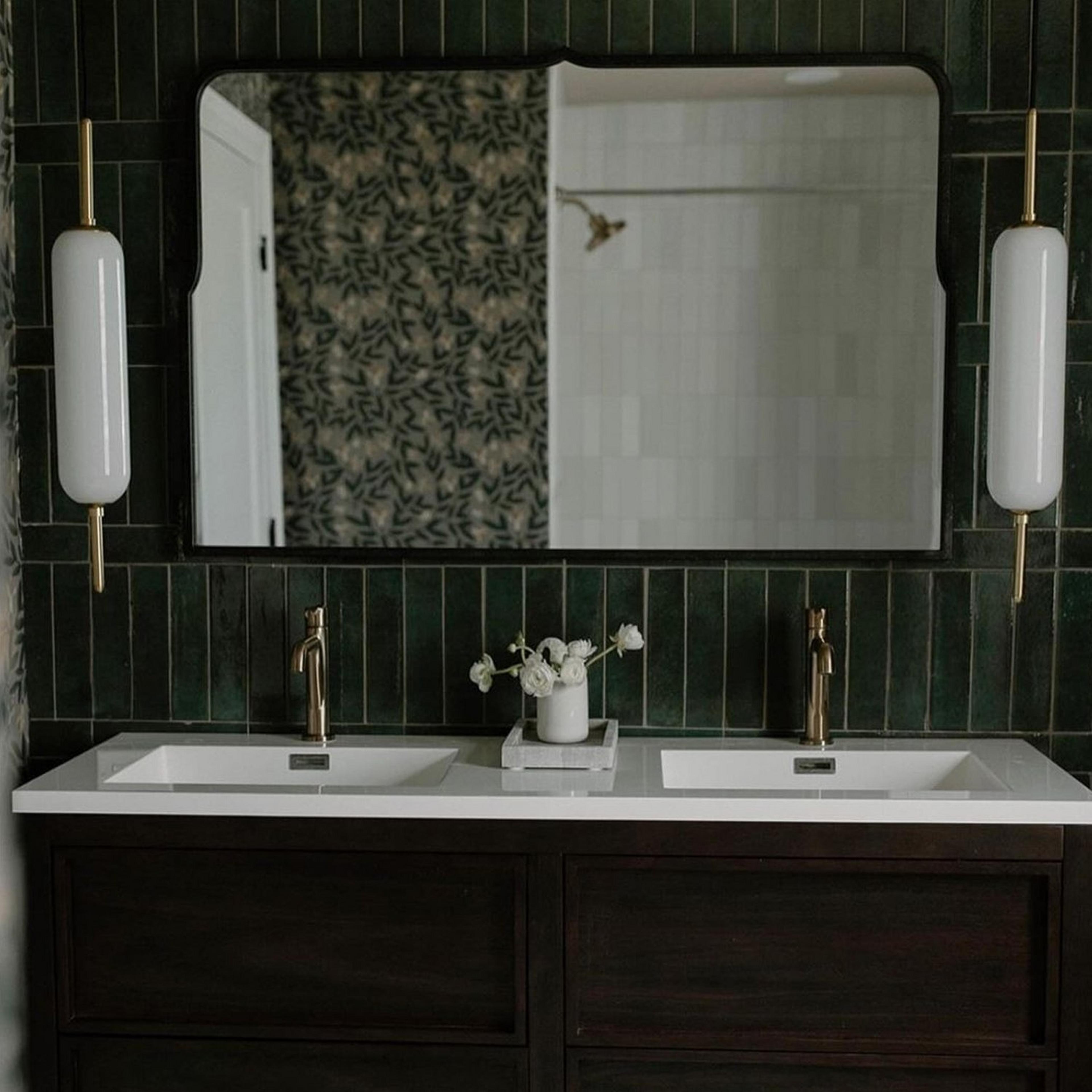 Distressed black Bernadette Mirror in dark and moody bathroom