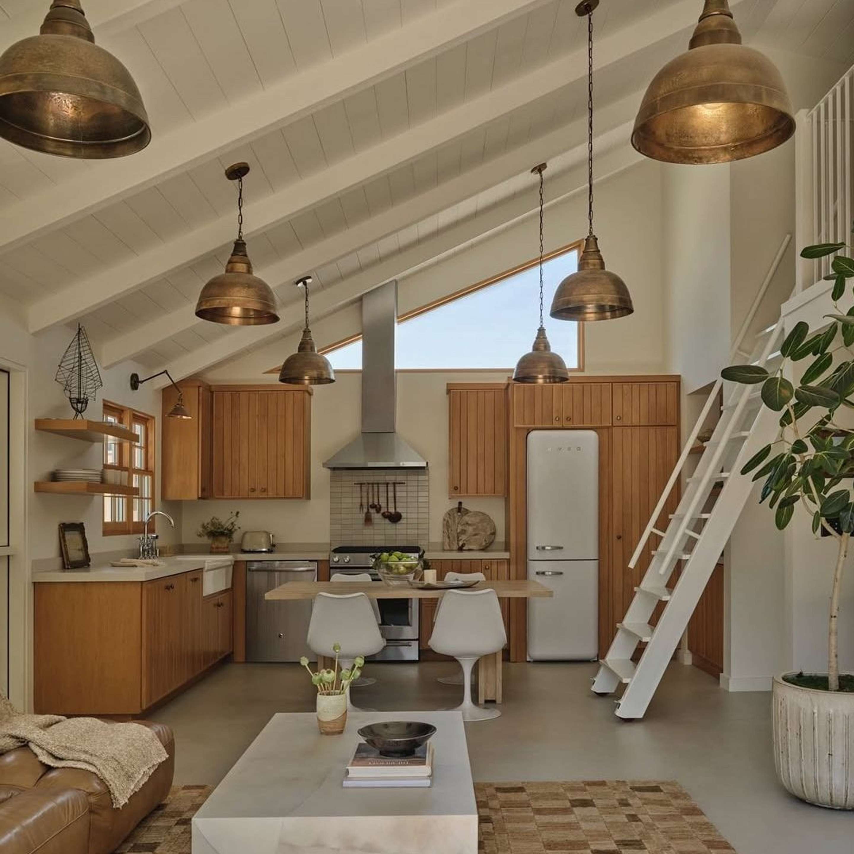 Large Oxidized Brass Fire and Earth Pendants in a guest house
