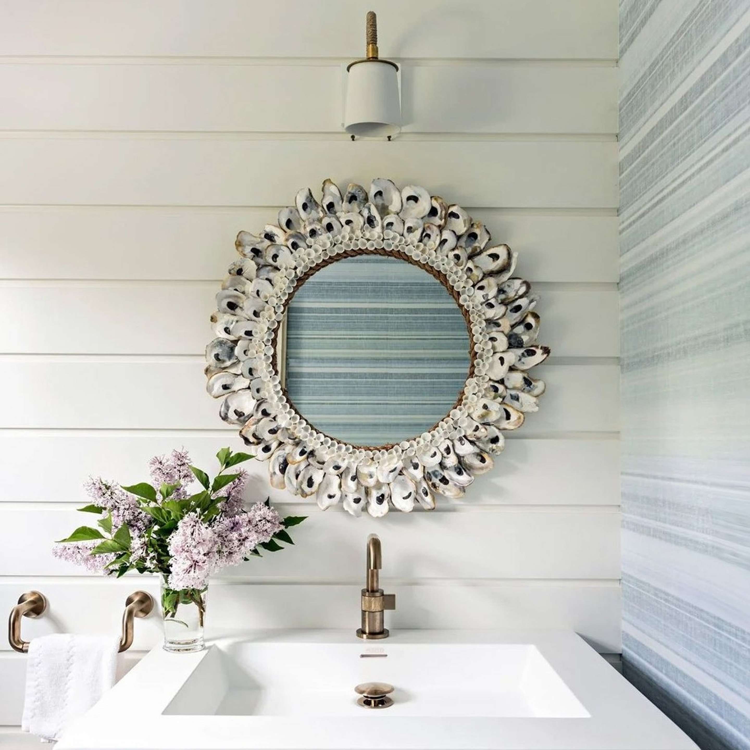 Round Oyster Shell Mirror in bathroom
