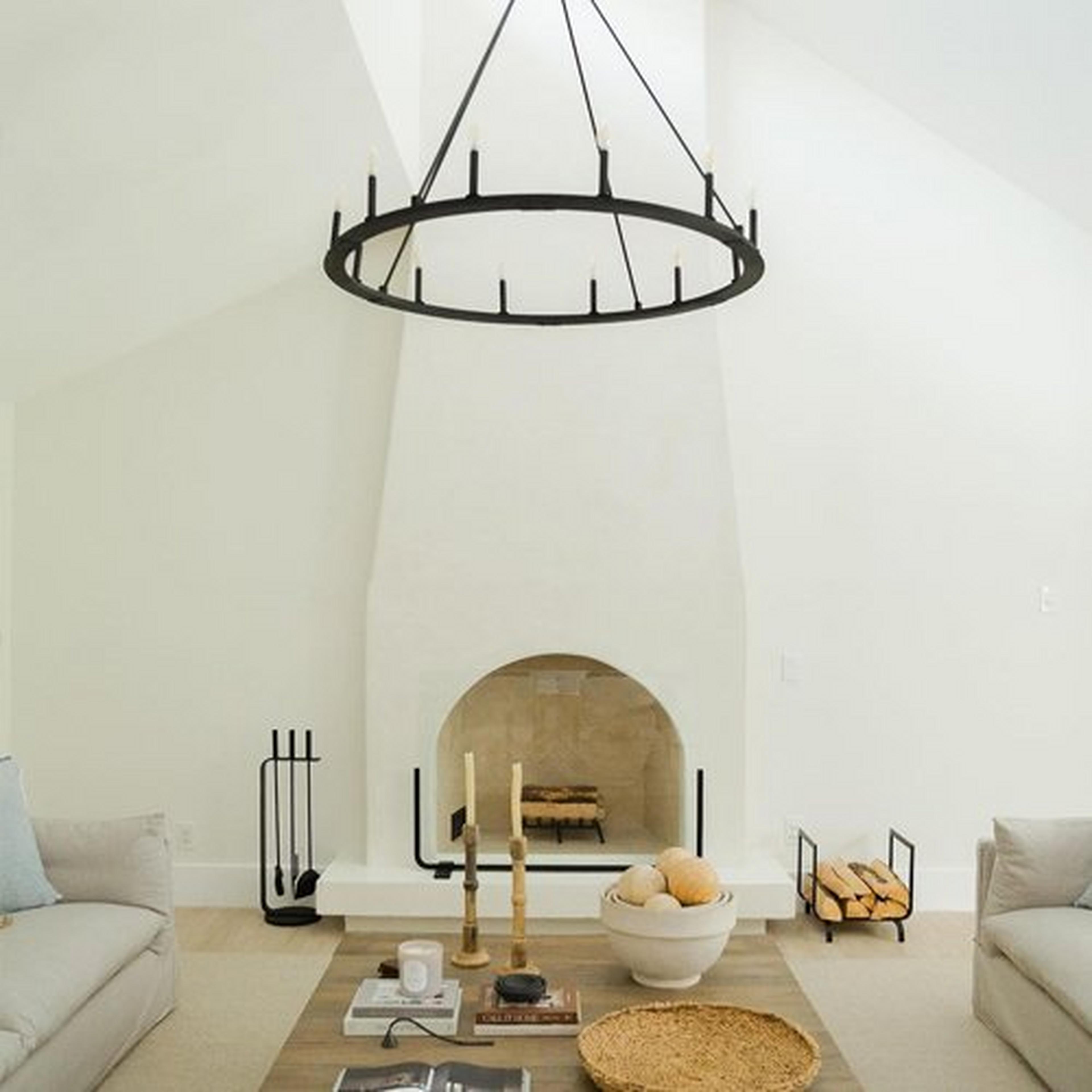 Brass and White Marble Stone Link Pendant hangs beside an Oval Mirror