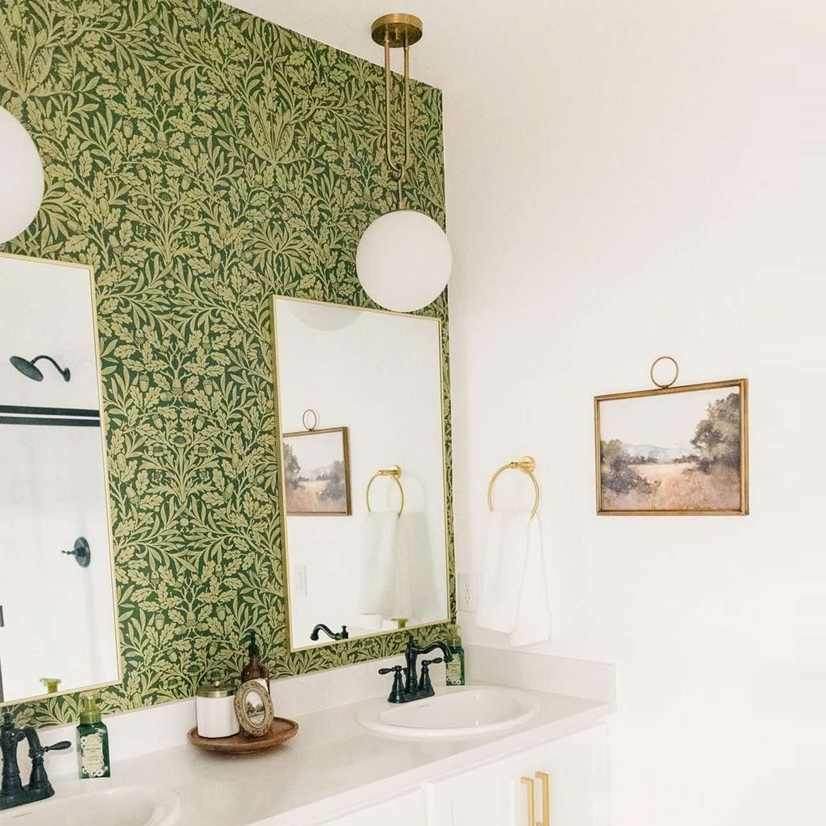 Milky Globe Drop Pendants over bathroom sinks