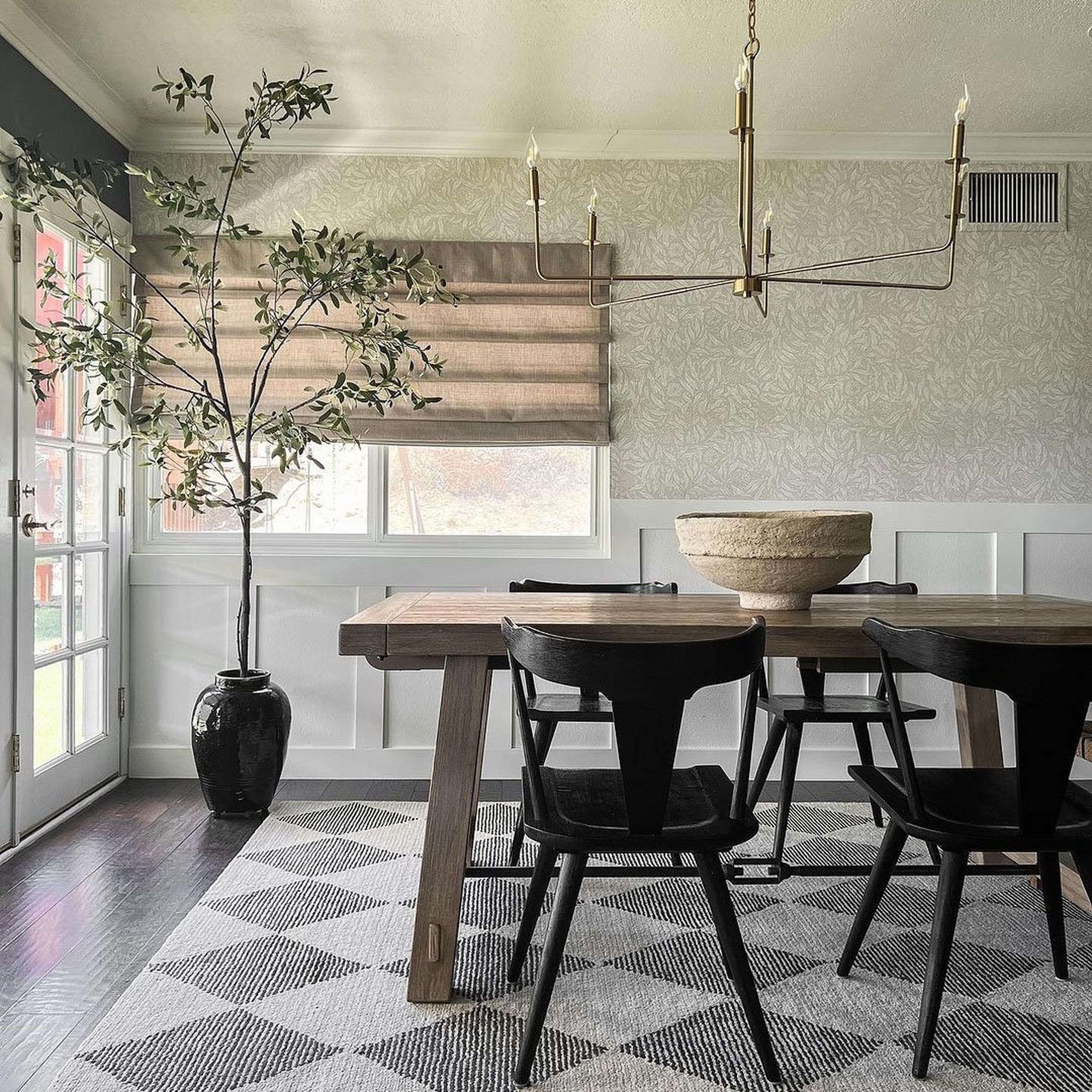 Elongated Spoke Chandelier in a modern rustic dining area