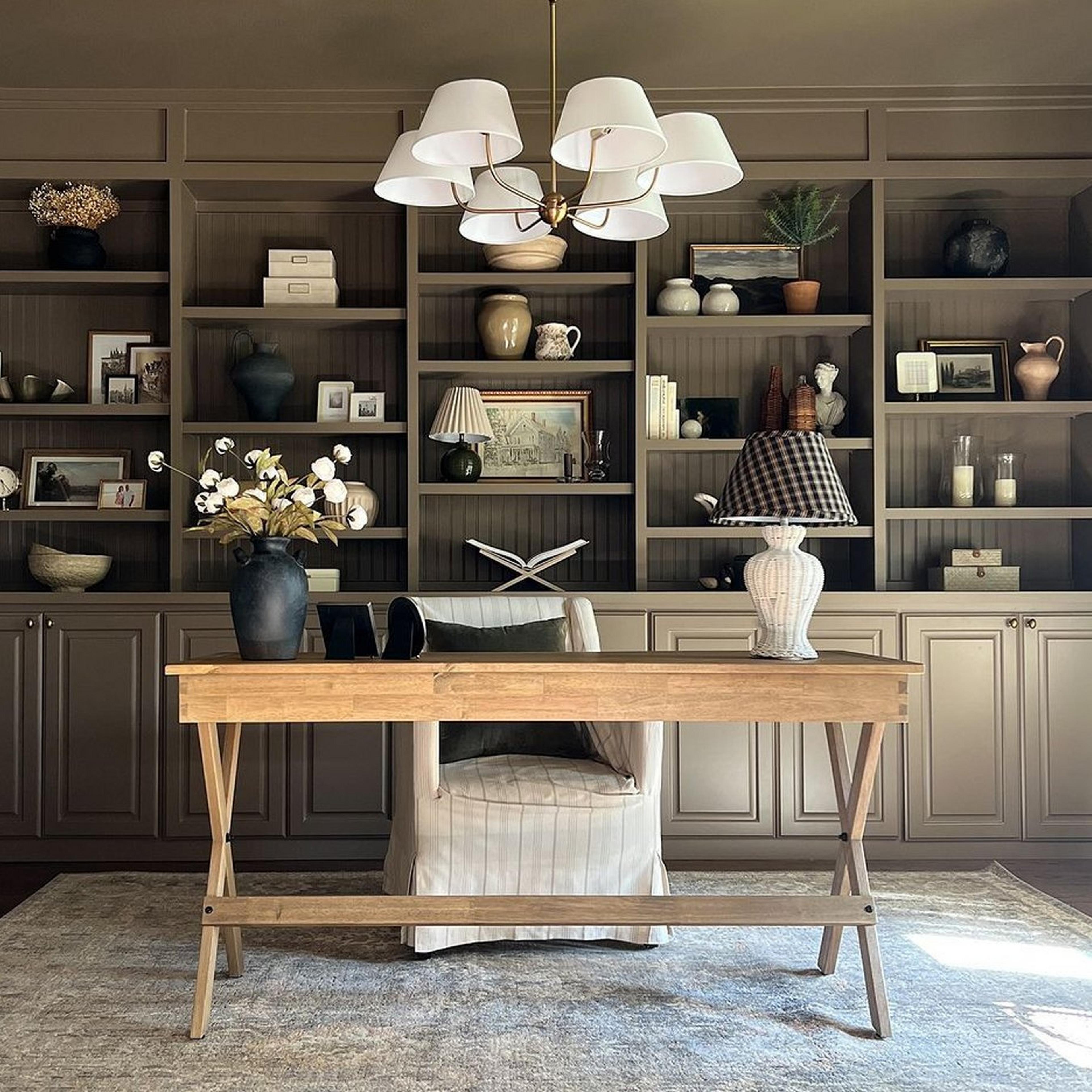 Aged brass Jardani chandelier in a traditional home office