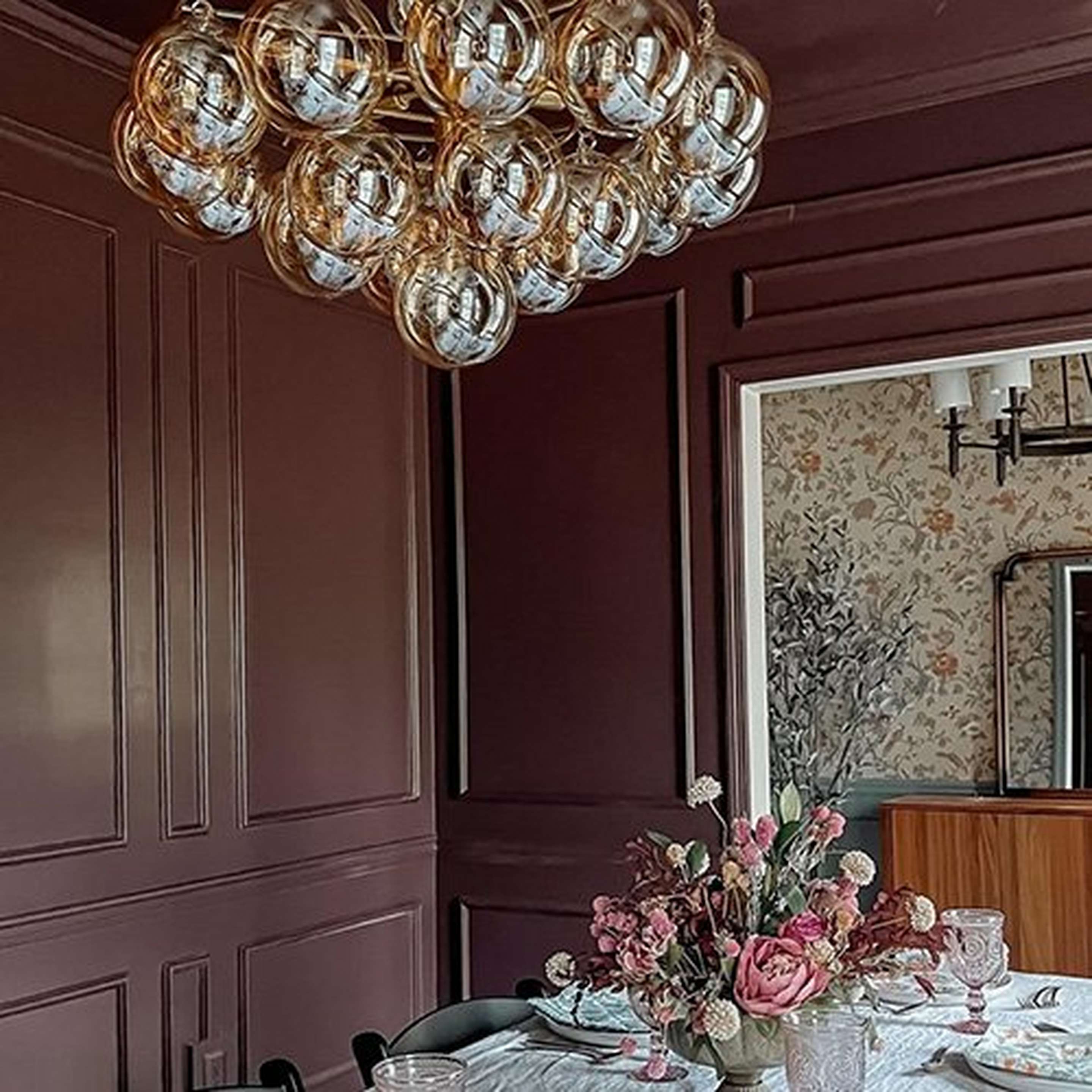 Amber Glass Elodie Chandelier in a dining room