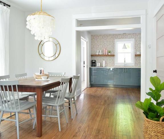 White and Gold Capiz Shell Chandelier over Farmhouse Kitchen Table