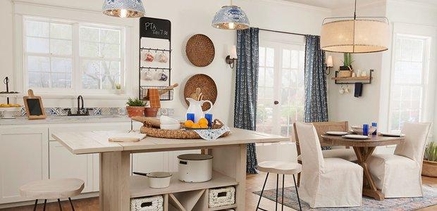 Bohemian kitchen with ceramic pendants and drum shade chandelier