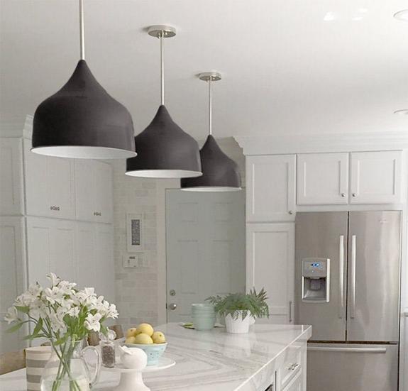 Black & white kitchen pendant lights over island