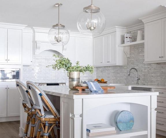 Glass kitchen pendant lights over island