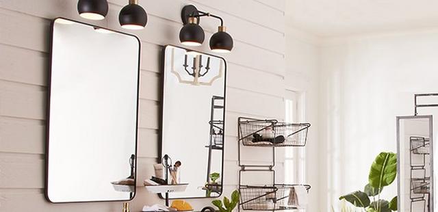 Two simple rectangular mirrors with black bubble bath lights