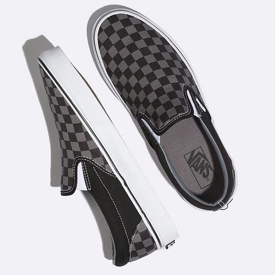 Black on black checkerboard slip on vans shop