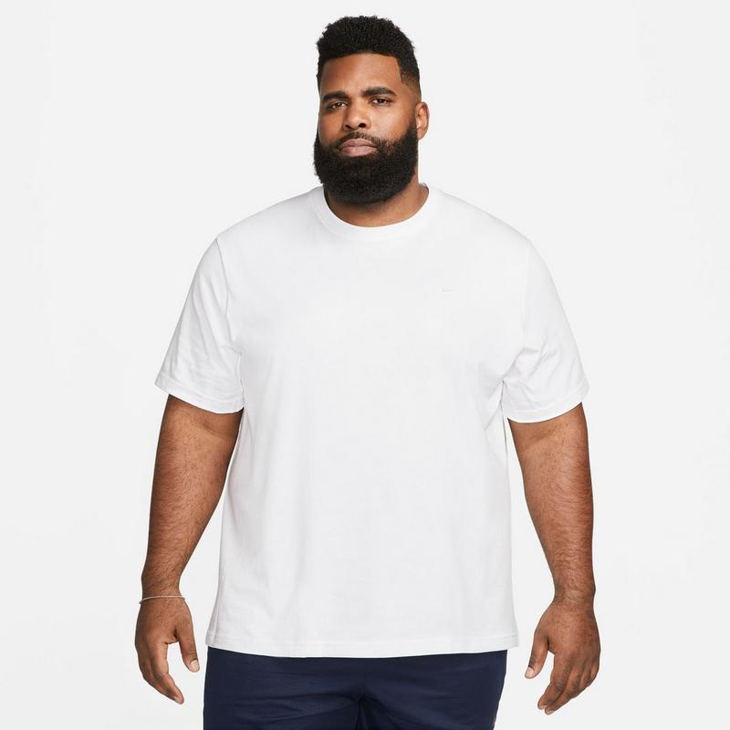 Nike Haut &agrave; manches courtes Primary Dri-FIT Versatile pour hommes