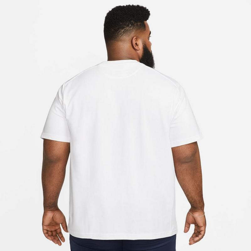 Nike Haut &agrave; manches courtes Primary Dri-FIT Versatile pour hommes