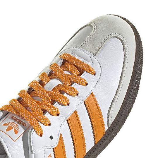 Adidas shoes with orange stripes best sale