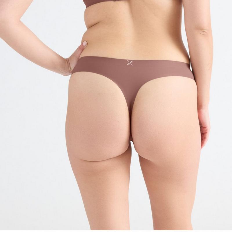 Knix Culotte tanga ultra-mince sans couture anti-fuite pour femmes