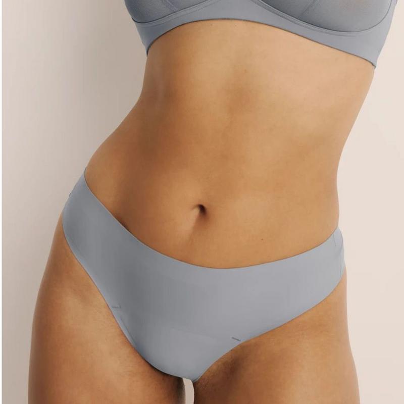 Knix Culotte tanga ultra-mince sans couture anti-fuite pour femmes