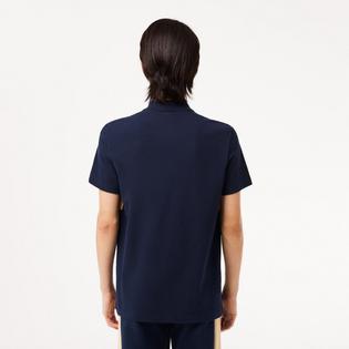 Lacoste Polo en piqu&eacute; extensible &agrave; blocs de couleur pour hommes