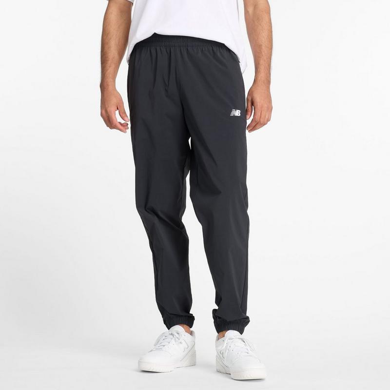 New Balance Pantalon de jogging tiss&eacute; extensible Athletics pour hommes