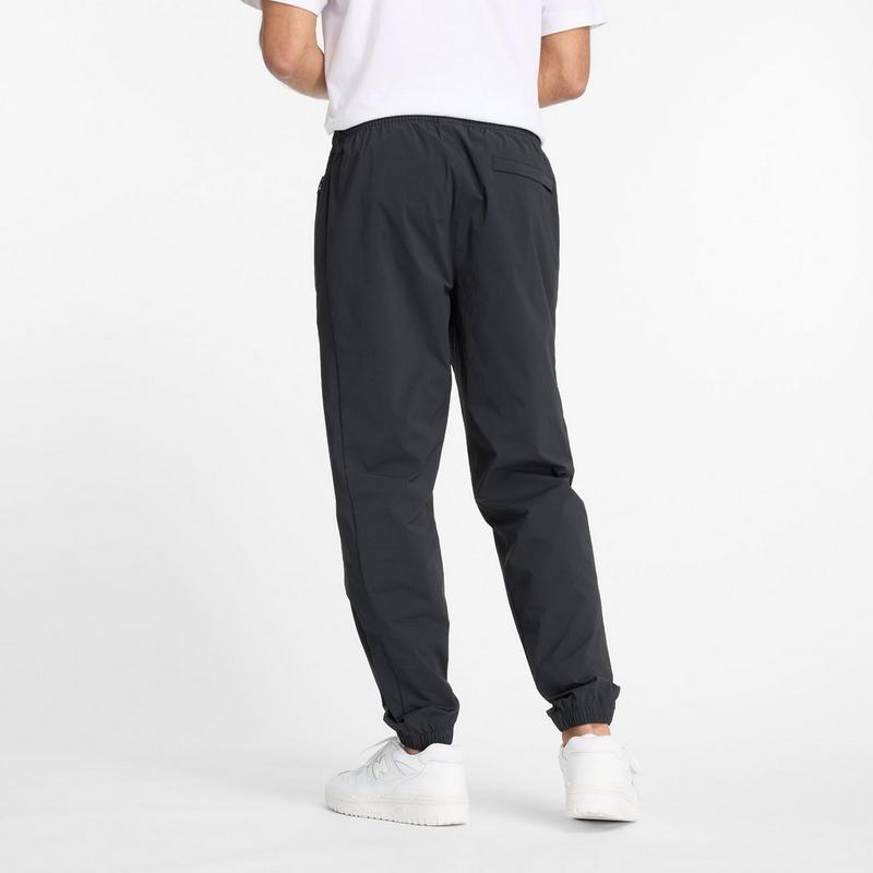 New Balance Pantalon de jogging tiss&eacute; extensible Athletics pour hommes