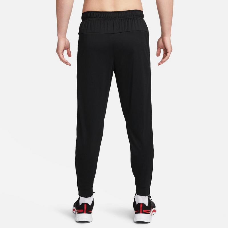 Nike Pantalon fusel&eacute; Totality Dri-FIT Versatile pour hommes
