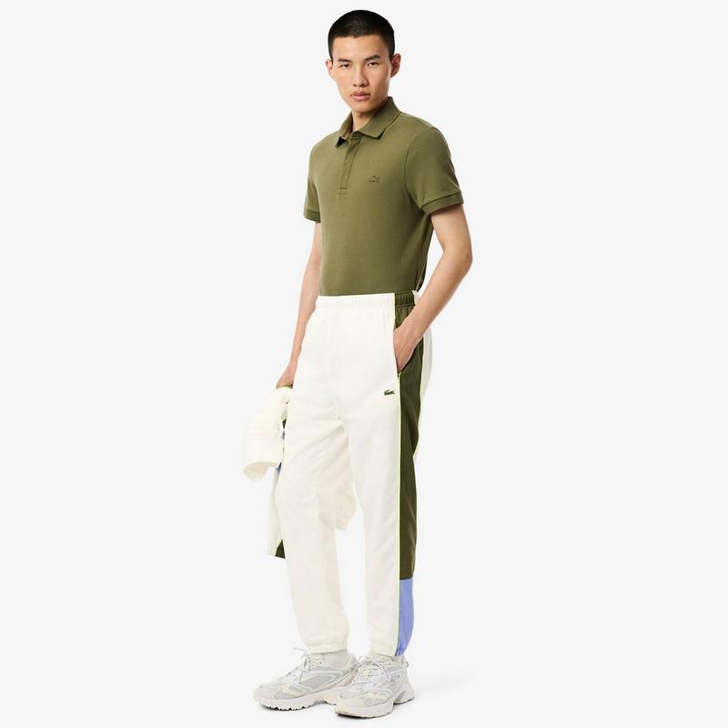Lacoste Pantalon de jogging en molleton &agrave; jambes fusel&eacute;es pour hommes