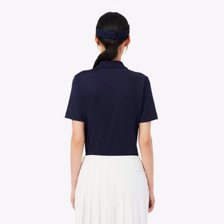 Lacoste Polo de golf extensible &agrave; coupe ajust&eacute;e UV Protect pour femmes
