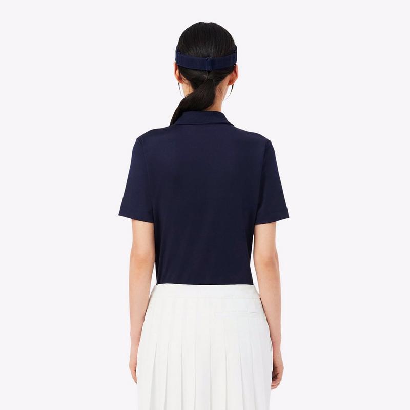 Lacoste Polo de golf extensible &agrave; coupe ajust&eacute;e UV Protect pour femmes