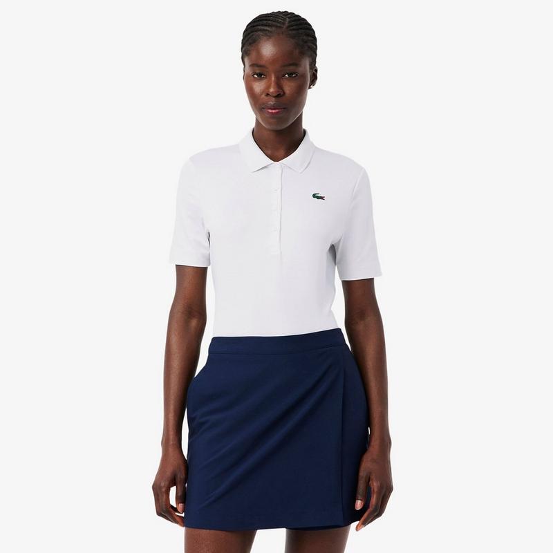 Lacoste Polo de golf extensible &agrave; coupe ajust&eacute;e UV Protect pour femmes