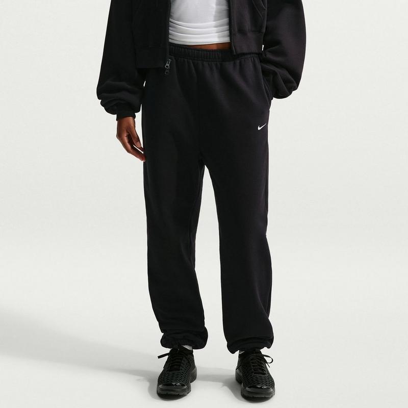 Nike Pantalon Studio en molleton &agrave; ourlet retourn&eacute; pour femmes