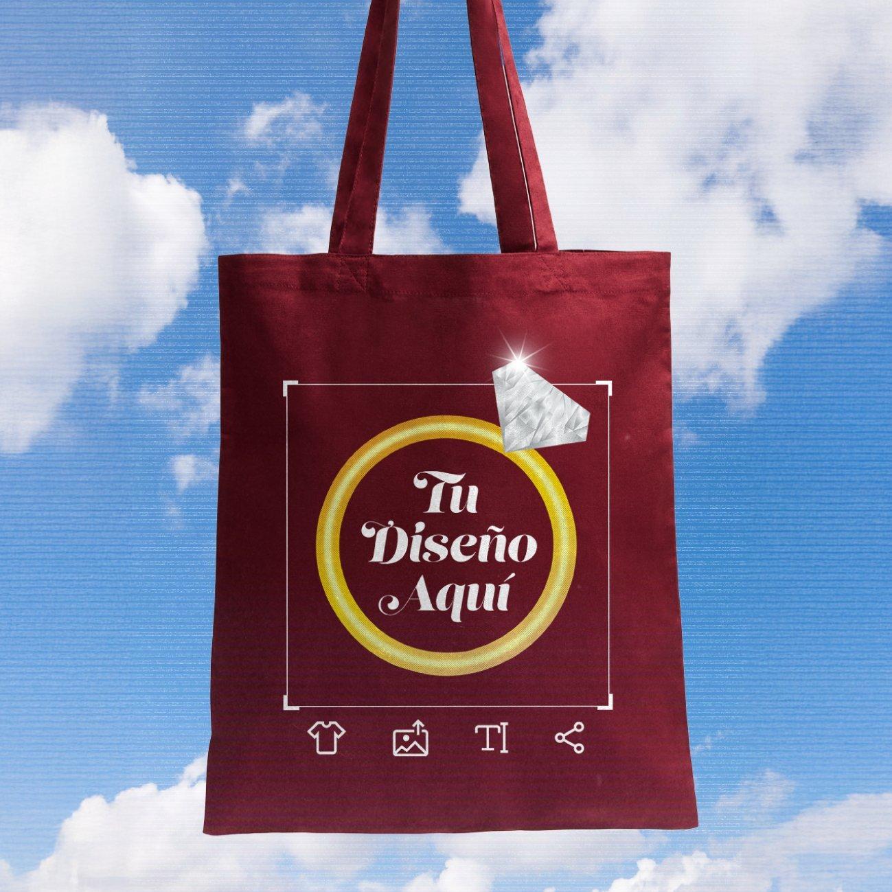 Una bolsa de tela color burdeos con diseño provisional y la inscripción «Tu diseño aquí»