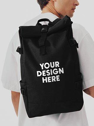 Man is wearing a black backpack with the inscription "Your design here."