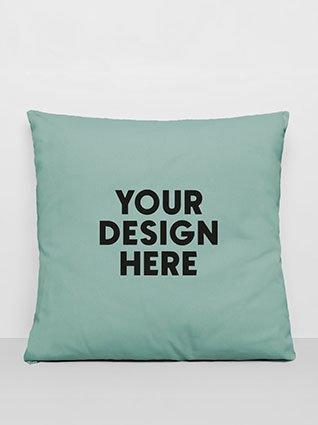 Square cushion in mint green with black "Your design here" print in the center.